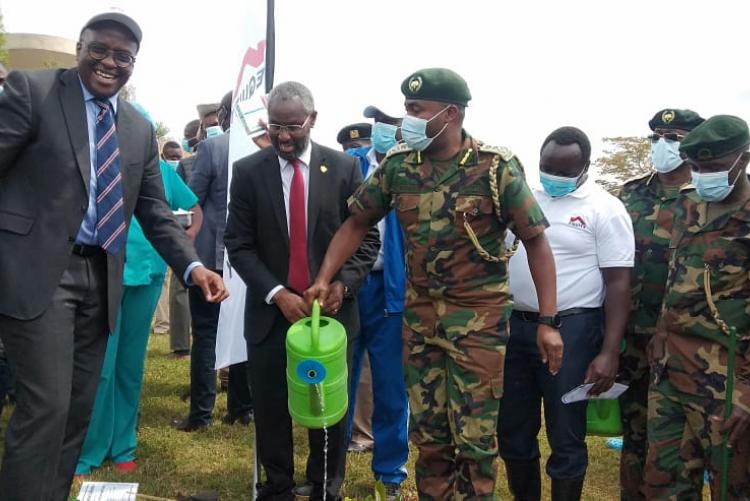 Equity Bank Group Chief Commercial Officer Polycarp Igathe (Left ), UoN Vice Chancellor Prof Stephen Kiama and Julius Wambugu Kamau Chief Conservator of Forests