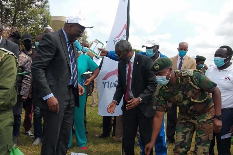 Equity Bank Group Chief Commercial Officer Polycarp Igathe (Left ), UoN Vice Chancellor Prof Stephen Kiama and Julius Wambugu Kamau Chief Conservator of Forests