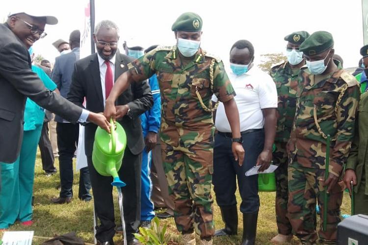 Equity Bank Group Chief Commercial Officer Polycarp Igathe (Left ), UoN Vice Chancellor Prof Stephen Kiama and Julius Wambugu Kamau Chief Conservator of Forests